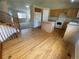 Kitchen with hardwood floors and center island at 10067 Idalia St, Commerce City, CO 80022