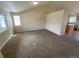 Bright and airy living room featuring carpeted floors at 10067 Idalia St, Commerce City, CO 80022