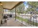 Balcony overlooking the parking lot and landscaping features outdoor seating at 4653 S Lowell Blvd # E, Denver, CO 80236