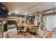 Fun recreation room featuring a bunk bed, game table, gun rack and rustic lodge decor at 3842 Estates Cir, Larkspur, CO 80118