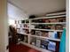 Spacious basement with built-in shelves for storage, offering additional space at 723 Steele St, Denver, CO 80206