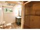 Modern bathroom featuring a sleek glass shower, vanity with storage, and stylish fixtures at 723 Steele St, Denver, CO 80206