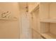 Walk-in closet features custom shelving and hanging space for optimal organization at 723 Steele St, Denver, CO 80206