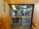 Close-up of a wooden door with decorative glass and lead inlays at 723 Steele St, Denver, CO 80206