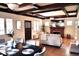 Bright living room with hardwood floors, fireplace, and stylish furniture at 723 Steele St, Denver, CO 80206
