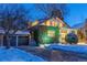 House exterior at night, showcasing architectural details and landscaping at 1920 Oneida St, Denver, CO 80220