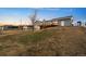 Spacious backyard with a large deck perfect for entertaining and a serene outdoor retreat at 44011 Morning Star Ct, Elizabeth, CO 80107