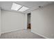 A clean and simple bedroom with plush carpeting, neutral walls, and a closet with a small dresser at 44011 Morning Star Ct, Elizabeth, CO 80107