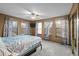 Bedroom with neutral walls, multiple windows, and carpeting at 44011 Morning Star Ct, Elizabeth, CO 80107