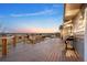 Spacious wooden deck with stainless steel cable railing offers panoramic views and outdoor entertaining space at 44011 Morning Star Ct, Elizabeth, CO 80107