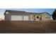 Ranch-style home featuring an attached two-car garage, neutral siding, and a well-maintained lawn at 44011 Morning Star Ct, Elizabeth, CO 80107
