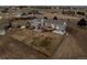 Aerial view of a single-Gathering home with a large deck, patio, fenced yard, and mature trees at 44011 Morning Star Ct, Elizabeth, CO 80107