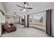 Inviting living area with large windows offering scenic views at 44011 Morning Star Ct, Elizabeth, CO 80107