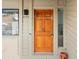 Welcoming front door with wood finish, modern hardware, and sidelight window detail at 4009 Wonderland Hill Ave, Boulder, CO 80304