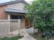 Charming home entrance with a beautiful wood door and well-maintained landscaping at 4009 Wonderland Hill Ave, Boulder, CO 80304