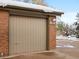 Attached garage with a clean, neutral-toned door, showcasing convenient parking at 4009 Wonderland Hill Ave, Boulder, CO 80304