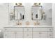 Elegant bathroom with double vanity, marble countertop, and gold fixtures at 474 S Vine St, Denver, CO 80209