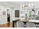 This dining area offers an open floor plan with sight lines to the kitchen and living room at 474 S Vine St, Denver, CO 80209