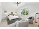 Bright main bedroom with vaulted ceiling, large windows, and stylish furnishings at 474 S Vine St, Denver, CO 80209