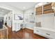 Bright office space with built in storage, stylish decor, and hardwood flooring at 474 S Vine St, Denver, CO 80209