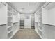 Spacious walk-in closet with custom shelving and ample storage space at 474 S Vine St, Denver, CO 80209
