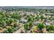 Aerial view of neighborhood homes featuring mature trees at 2990 S Sherman St, Englewood, CO 80113