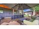 This outdoor living space features a bar, wood deck, and modern seating at 2990 S Sherman St, Englewood, CO 80113
