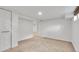 Finished basement area with access to another room and closet at 2990 S Sherman St, Englewood, CO 80113