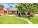Charming home with a manicured front yard and welcoming porch at 2990 S Sherman St, Englewood, CO 80113