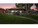 Charming single-story home featuring a welcoming front porch and lush green lawn at 2990 S Sherman St, Englewood, CO 80113