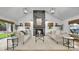 Bright living room features vaulted ceilings, a stone fireplace, and hardwood floors at 2990 S Sherman St, Englewood, CO 80113