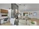 Bright living room features vaulted ceilings, a stone fireplace, and hardwood floors at 2990 S Sherman St, Englewood, CO 80113