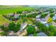 A beautiful community with green spaces and homes with fenced yards and solar panels at 7961 Jared Way, Littleton, CO 80125