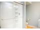 Bright bathroom with a white glass enclosed shower and a modern vanity at 7961 Jared Way, Littleton, CO 80125