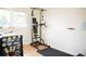 Workout room featuring a weight training system, black workout mat, and plenty of light at 7961 Jared Way, Littleton, CO 80125