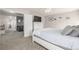 This bedroom has a queen-sized bed and is accessible to another room at 4950 Mt Cameron Dr, Brighton, CO 80601