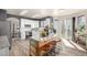 Bright kitchen featuring an island with seating and modern appliances at 4950 Mt Cameron Dr, Brighton, CO 80601