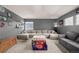 Expansive living room featuring comfortable seating and playful decorations at 4950 Mt Cameron Dr, Brighton, CO 80601