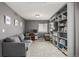 Cozy recreation room with shelving and comfortable seating, great for entertainment at 4950 Mt Cameron Dr, Brighton, CO 80601