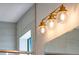 Bright bathroom featuring an enclosed glass shower, recessed lighting, and gold hardware at 16778 W 93Rd Pl, Arvada, CO 80007