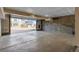 Unfinished two-car garage with concrete floor, ready for your vehicles and storage or customization at 16778 W 93Rd Pl, Arvada, CO 80007