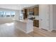 Kitchen with white counter tops, stainless steel appliances, and bright natural light at 16778 W 93Rd Pl, Arvada, CO 80007