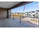 Outdoor patio overlooking a neighborhood and view of the mountains on a sunny day at 16778 W 93Rd Pl, Arvada, CO 80007