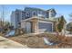 Charming two-story home features a gray facade and a convenient two-car garage at 4666 Cornish Way, Denver, CO 80239