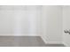 Simple walk-in closet with installed wire shelving and neutral carpet at 45922 Gentry Ave, Bennett, CO 80102