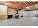 Unfinished basement with exposed ceiling and workout equipment at 1820 Ghost Dance Cir, Castle Rock, CO 80108