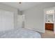 Spacious bedroom with ensuite bathroom and walk in closet at 1820 Ghost Dance Cir, Castle Rock, CO 80108