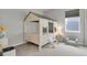 bedroom featuring a house-shaped bed frame, and large window for natural light at 1820 Ghost Dance Cir, Castle Rock, CO 80108