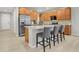 Spacious kitchen with stainless steel appliances, granite countertops, and a center island at 1820 Ghost Dance Cir, Castle Rock, CO 80108