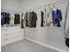 Walk-in closet with carpet, wire shelving, and built-in storage at 1820 Ghost Dance Cir, Castle Rock, CO 80108